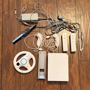 Nintendo Console with White and Gray Accessories